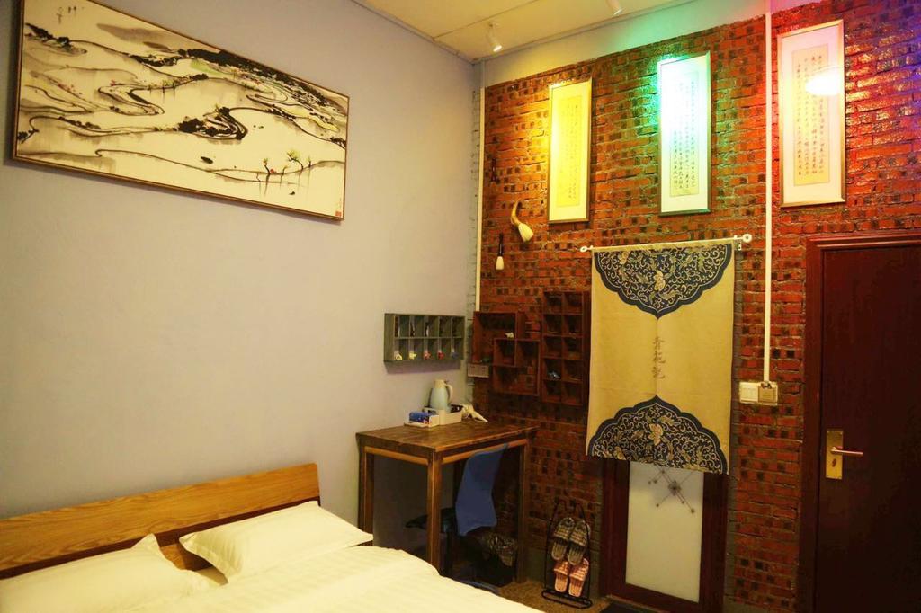 Zhaohuaxishi Youth Hostel Гуанчжоу Экстерьер фото