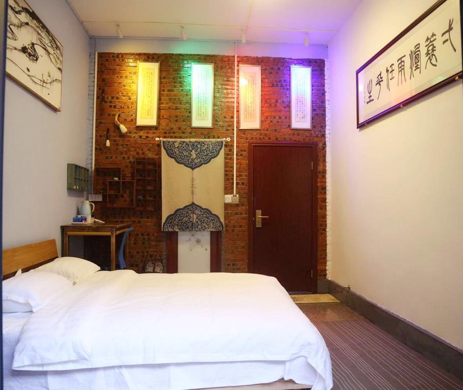 Zhaohuaxishi Youth Hostel Гуанчжоу Экстерьер фото